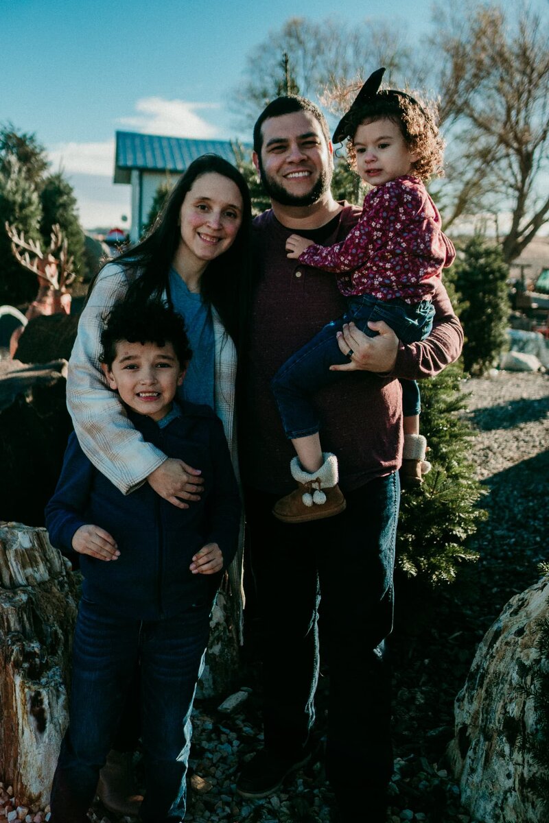 Maria with her husband and children