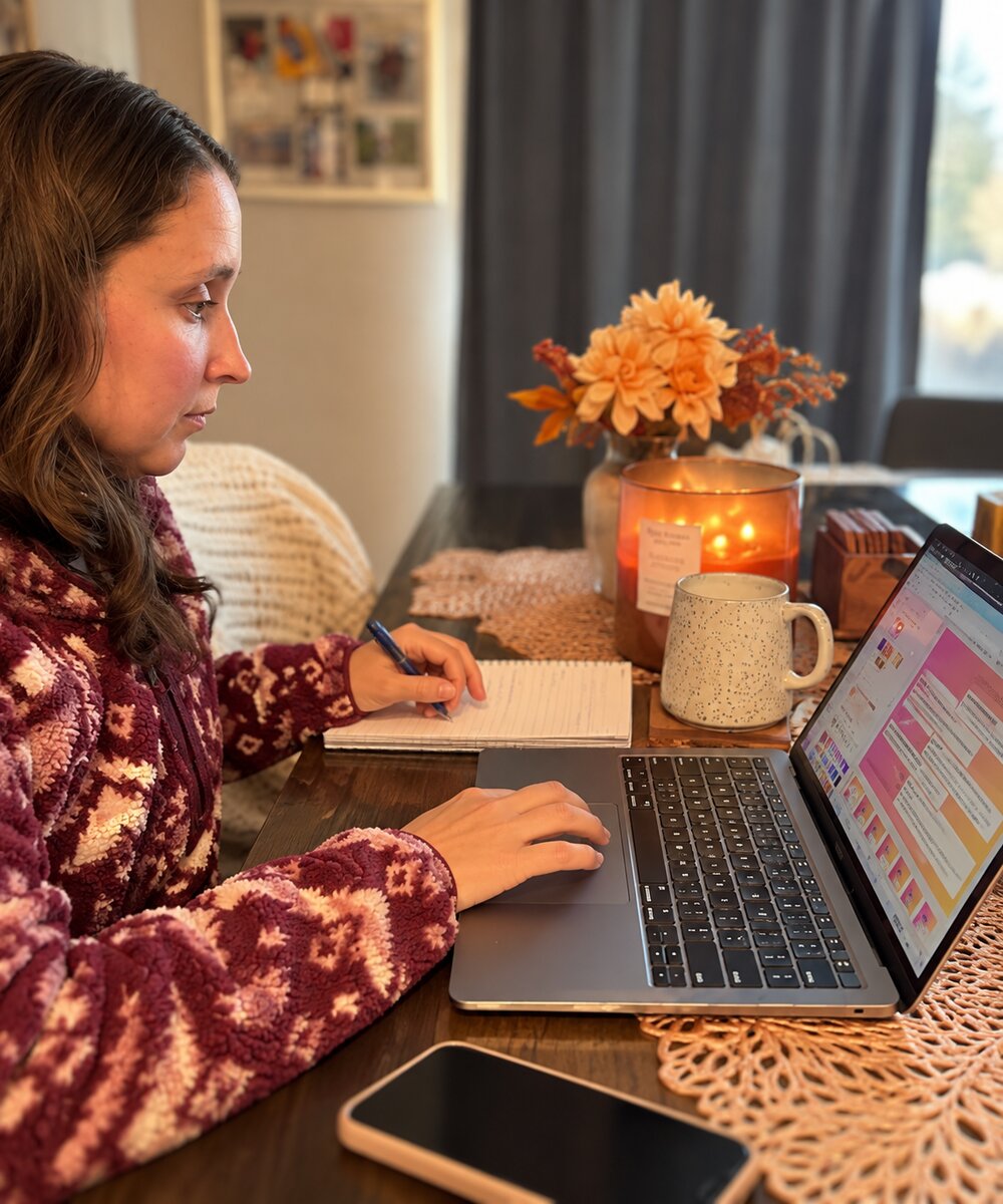 Maria working on her laptop at home